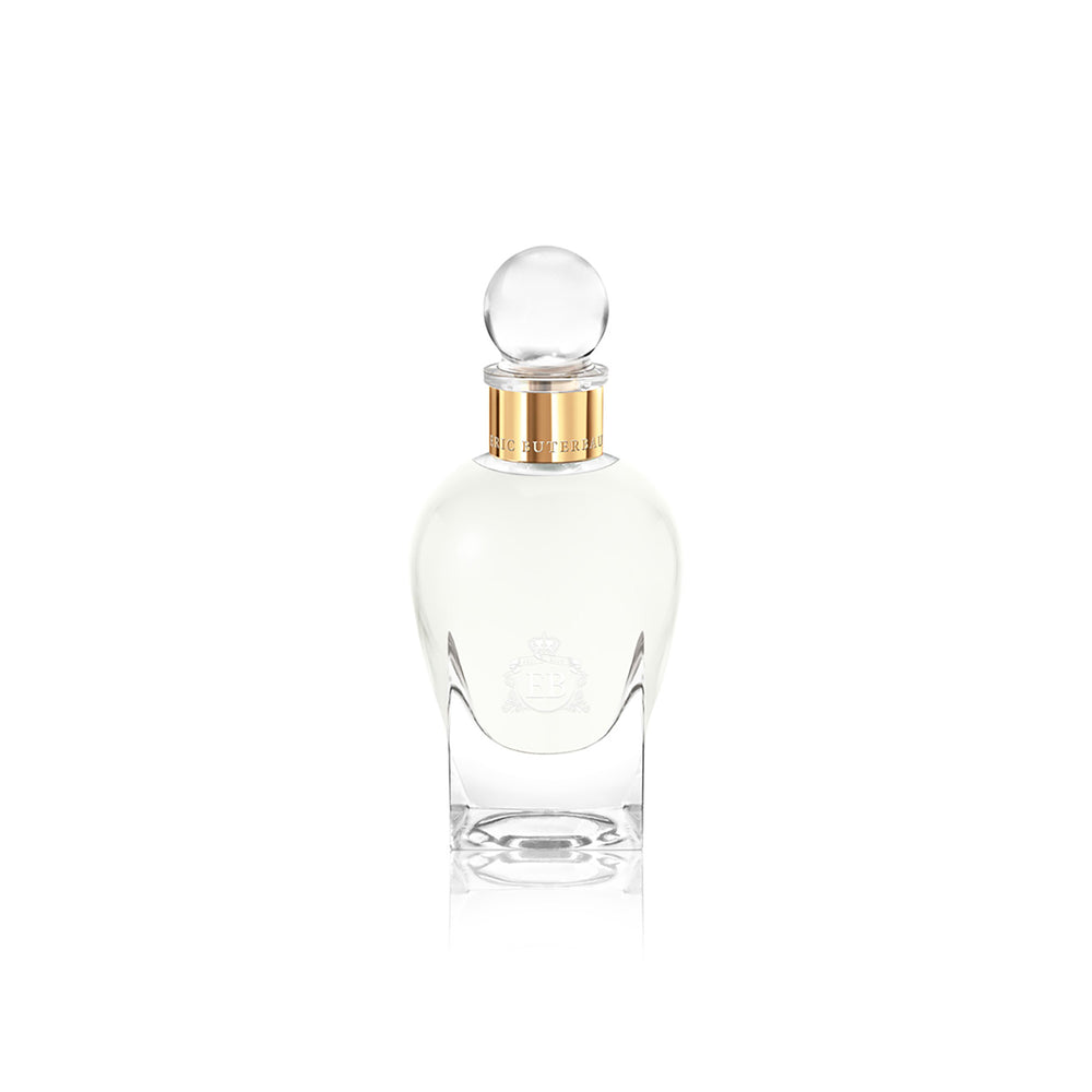 100 ml bottle, with transparent glass and yellowish perfum. Spherical cap with gold band. Kingston Osmanthus, a fragrance by Eric Butherbaugh.