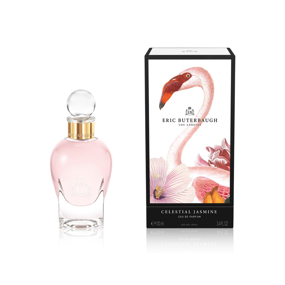 100 ml bottle, with transparent glass and pinkish perfum. Spherical cap with gold band. By his side the box, with pink flamingo and flowers illustration, within a black border. Celestial Jasmine, a fragrance by Eric Butherbaugh.