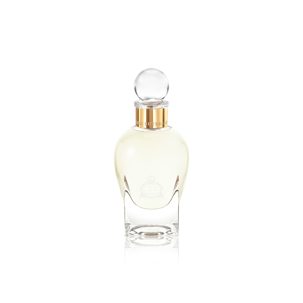 100 ml bottle, with transparent glass and yellowish perfum. Spherical cap with gold band. Fabulous Magnolia, a fragrance by Eric Butherbaugh.