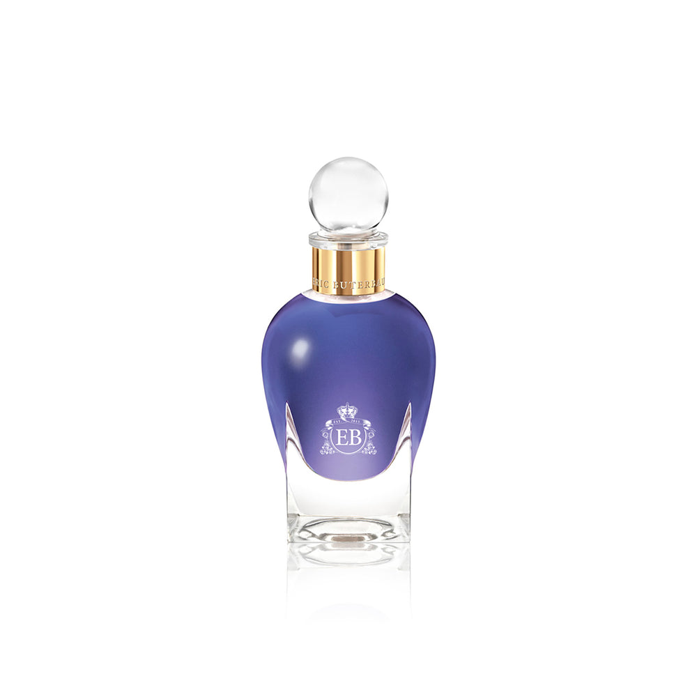 100 ml bottle, with transparent glass and violet perfum. Spherical cap with gold band. Fragile Violet, a fragrance by Eric Butherbaugh.