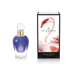 100 ml bottle, with transparent glass and violet perfum. Spherical cap with gold band. By his side the box, with pink flamingo and flowers illustration, within a black border. Fragile Violet, a fragrance by Eric Butherbaugh.