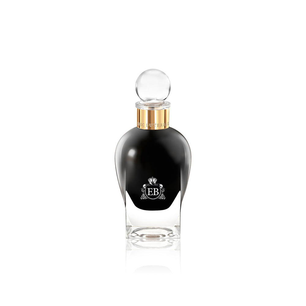 100 ml bottle, with  black opaque glass. Spherical cap with gold band. Oud Gardenia, a fragrance by Eric Butherbaugh.