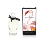 250 ml bottle, with transparent glass and yellowish perfum. Spherical cap with black ribbon. By his side the box, with pink flamingo and flowers illustration, within a black border. Fabulous Magnolia, a fragrance by Eric Butherbaugh.