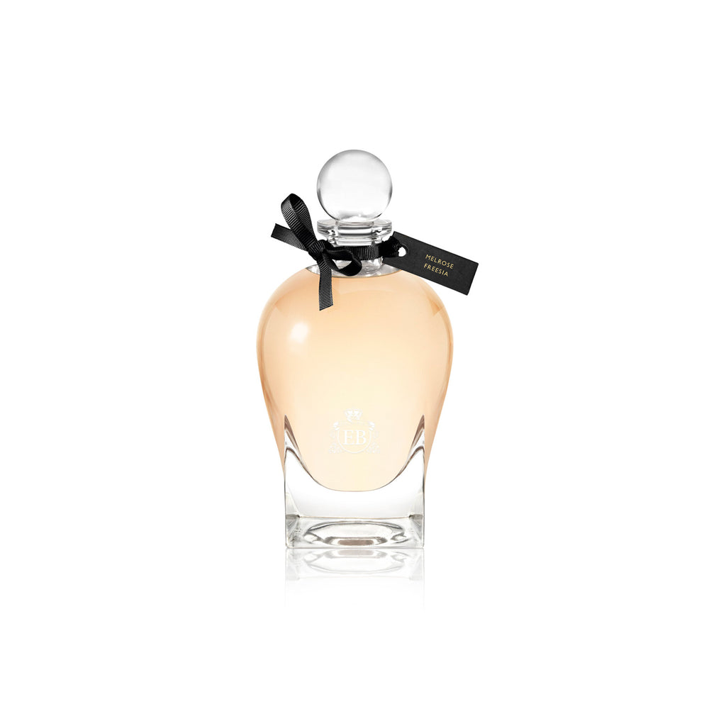 250 ml bottle, with transparent glass and orangey perfum. Spherical cap with black ribbon. Melrose Fresia, a fragrance by Eric Butherbaugh.