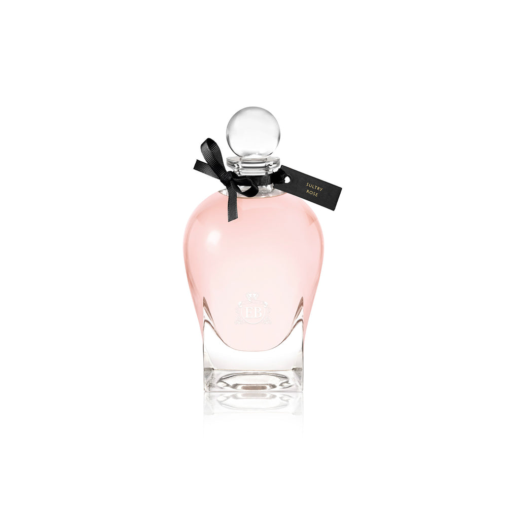 250 ml bottle, with transparent glass and pinkish perfum. Spherical cap with black ribbon. Sultry Rose, a fragrance by Eric Butherbaugh.