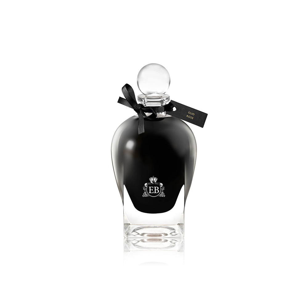 250 ml bottle, with  black opaque glass. Spherical cap with black ribbon. Oud Rose, a fragrance by Eric Butherbaugh.