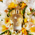 A 100 ml Fabulous Magnolia bottle lying on a bed of magnolias.